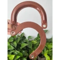 Tobacco brown shiny patent leather Dior-type bag handles complete with gold rings for mounting