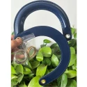 Blue glossy patent leather Dior-type bag handles complete with gold rings for mounting