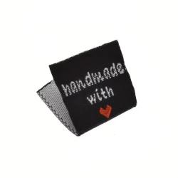 Embroidered viscose labels with 'handmade with love' inscription