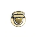 Folder clasp with heart-shaped button for handmade bags
