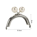 Large pearl clasp purse with silver frame snap fastener