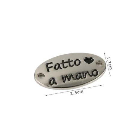 Etichetta in metallo da cucire “Fatto a Mano” oro/argento