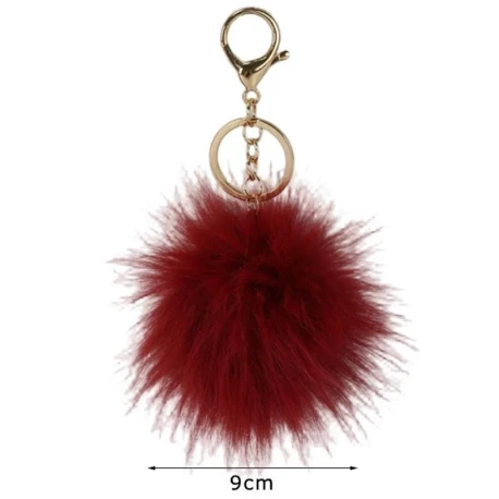 Ciondolo borsa e portachiavi Pom Pom 9 cm eco pelliccia oro