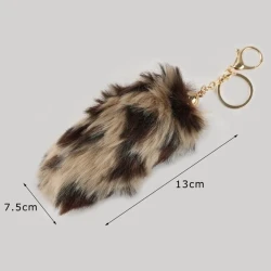 Ciondolo borsa eco pelliccia maculata 13 cm oro 2