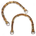 Small semi-circular bag handles in natural bamboo with silver ring