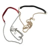 Gold chain bag strap handle with faux leather shoulder section